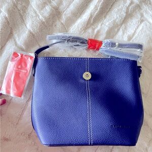 Beautiful brand new never used, blue David Jones purse with dust bag.